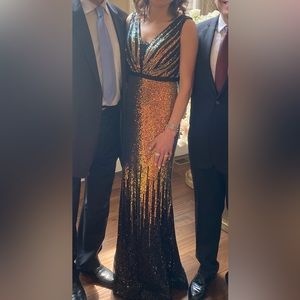 NOTE:there is a sequin piece attached to cover the deep v neck!!!